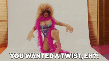 a picture of a drag queen with the words " you wanted a twist eh "