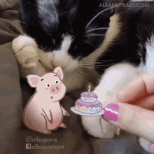 a black and white cat is laying on a bed while a person holds a birthday cake in front of it