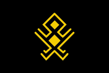 a yellow symbol on a black background with a square in the middle