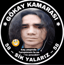 a sticker with a man 's face and the words gokay kamarasi on it