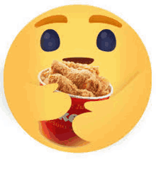 a smiley face is holding a bucket of fried chicken .