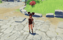 a girl is standing on a stone path in a video game