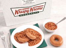 a krispy kreme doughnut with baked beans on it