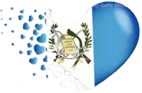 a heart shaped balloon with the flag of guatemala