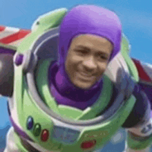 buzz lightyear from toy story is wearing a purple helmet and smiling while flying in the air .