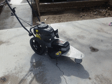 a lawn mower with a warning label that says ' warning ' on it