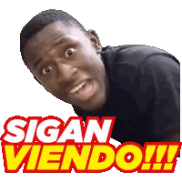 a sticker of a man with the words sigan viendo