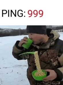 a man is drinking from a green cup while eating noodles from a green bowl .