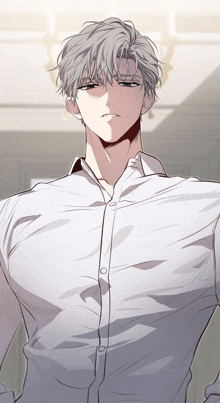 a man with gray hair is wearing a white shirt with buttons