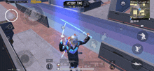 a person holding a sword in front of a screen that says " victory time "