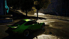 a green sports car is parked on the side of a road