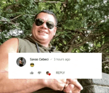 a man wearing sunglasses has a reply from savas cebeci