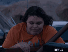 a woman in an orange shirt says nothing here netflix