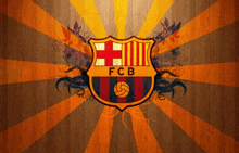 a fcb logo on a wooden background