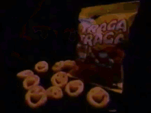 a bag of traga traga chips sits next to a cartoon character