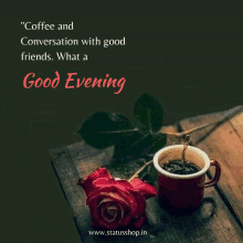 a cup of coffee and a rose on a wooden table with a good evening message