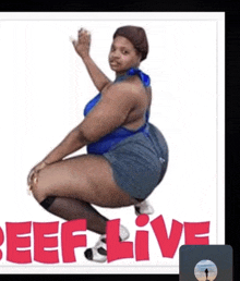 a woman in a blue tank top and shorts is squatting in front of a sign that says beef live .