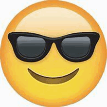 a yellow smiley face wearing sunglasses and smiling .