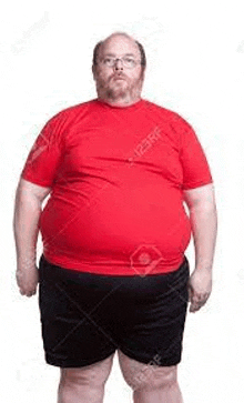 a very fat man wearing a red shirt and black shorts is standing in front of a white background .