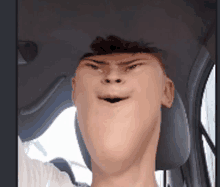 a man is making a funny face while driving a car