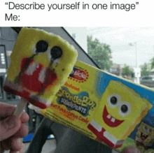 a person is holding a spongebob squarepants popsicle