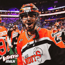 a hockey player wearing a helmet with the word bandits on his jersey