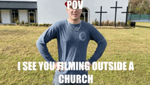 a man in a blue shirt stands in front of a church with the caption " pov "