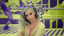 a woman with green hair and a very large breast is sitting in front of a green and purple background .