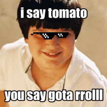 a boy wearing sunglasses with the words i say tomato you say gota roll