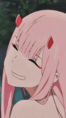 a girl with pink hair has red horns on her head