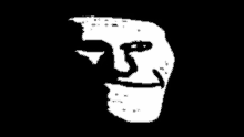 a black and white image of a troll face on a black background .