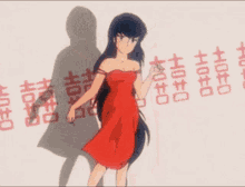 a woman in a red dress stands in front of a wall with chinese characters