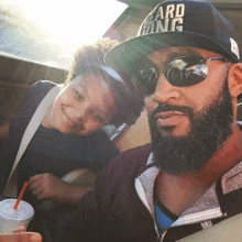 a man with a beard wearing a hat that says " beard king "