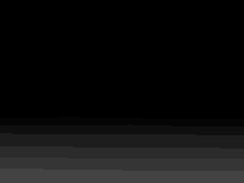 a black background with a white gradient in the middle