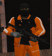 a man wearing a black mask and orange sweatpants holds a gun