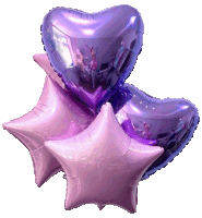 a bunch of purple balloons including a heart shaped balloon