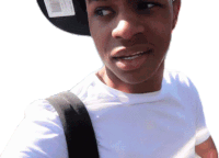 a young man wearing a white shirt and a black hat with a barcode on it