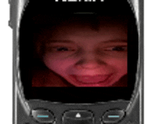 a cell phone with a picture of a smiling child on the screen