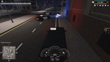 a screenshot of a video game shows a police car driving down the street