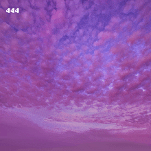 a purple cloudy sky with the numbers 444 on the bottom right