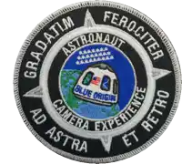 a patch that says astronaut on it and says camera experience