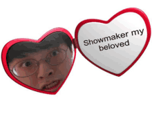 a heart shaped mirror says showmaker my beloved on it