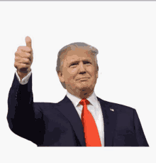 donald trump is giving a thumbs up sign