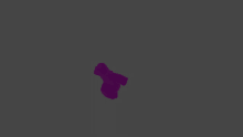 a purple object is floating in the dark on a grey background