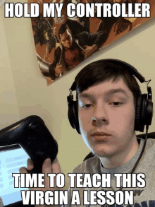 a man wearing headphones is holding a video game controller with a caption that says hold my controller