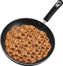 a frying pan filled with chocolate chip cookies