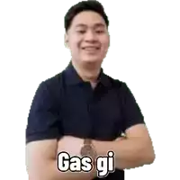 a man in a blue polo shirt is standing with his arms crossed and says gas gi .