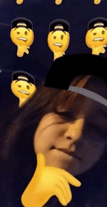 a person wearing a hat with smiley faces on them