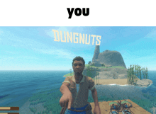 a man in a video game is pointing at the words " you dungnuts "