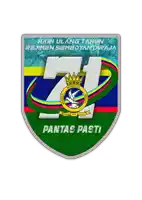 a green shield with the number 21 and pantas pasti on it